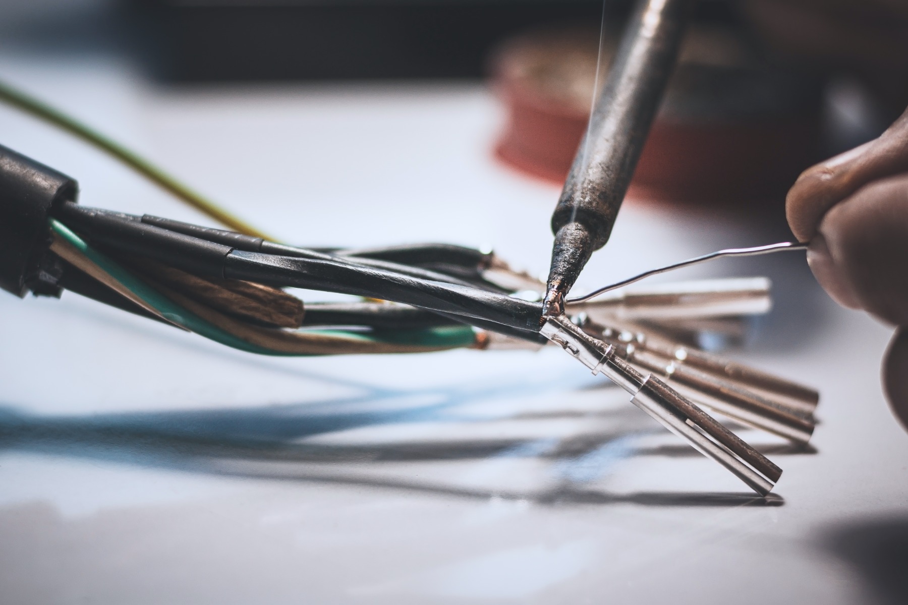 electricians-are-using-soldering-iron-connect-wires-metal-pin-with-soldering-lead