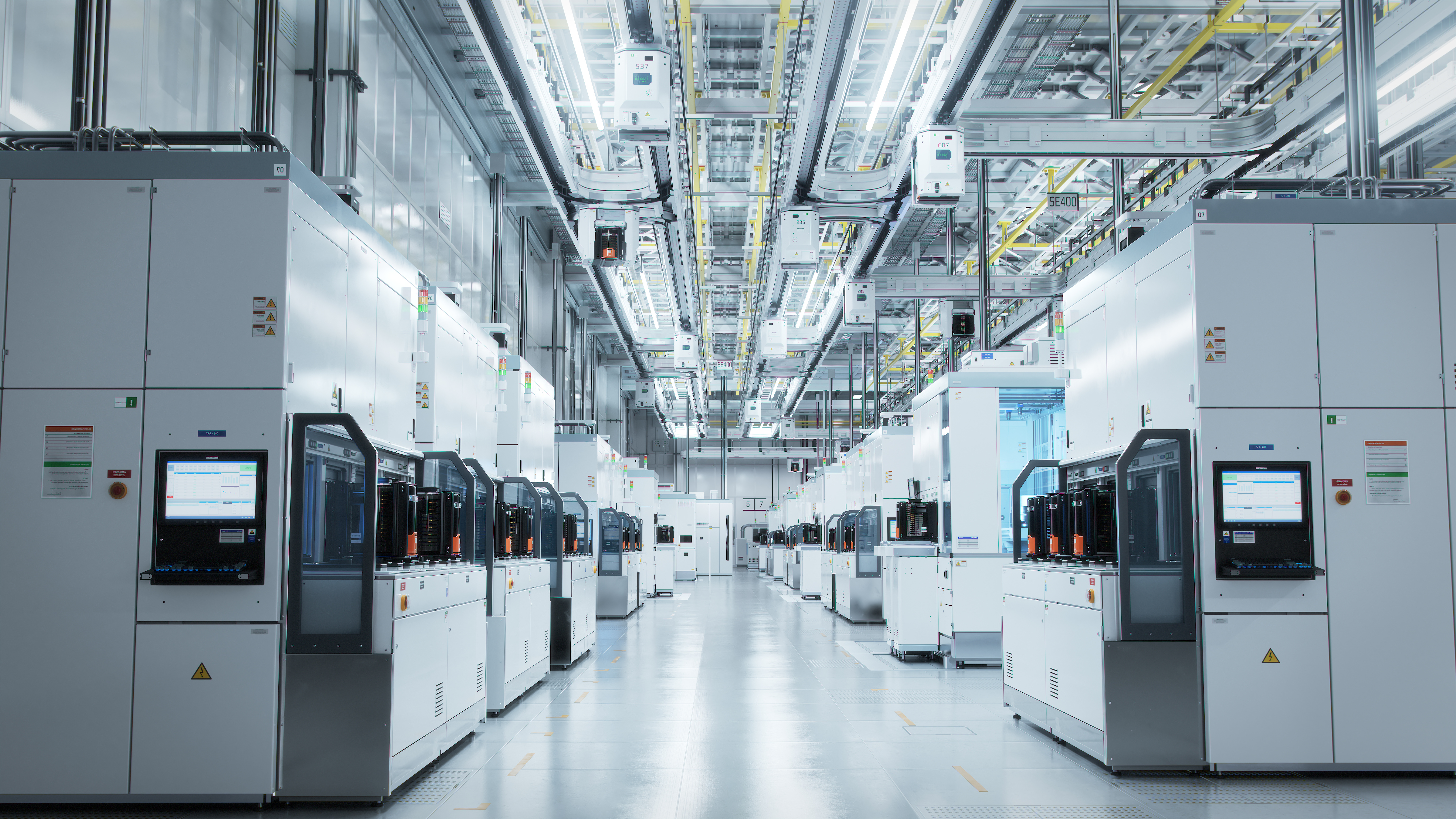 Wide shot of Bright Advanced Semiconductor Production Fab Cleanr